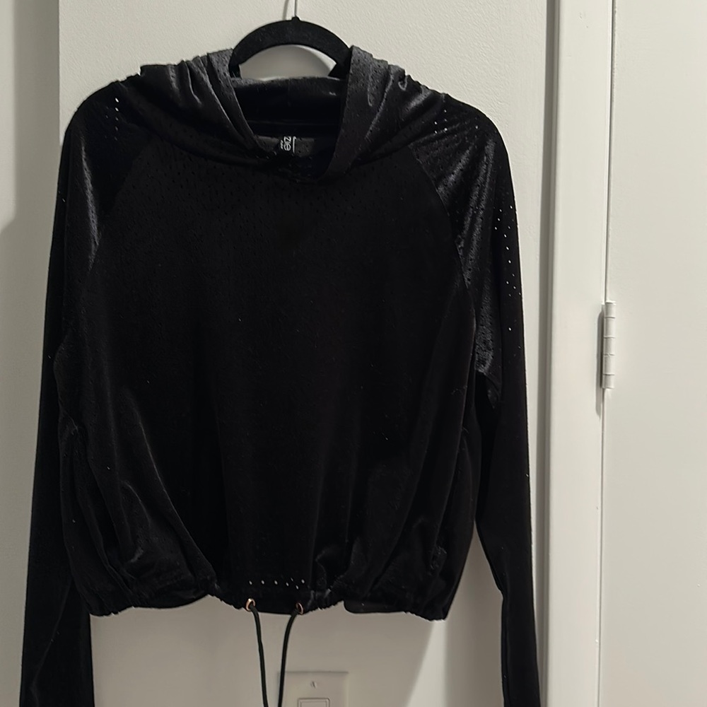 Onzie black velvet mesh hoodie with bottom drawstring.